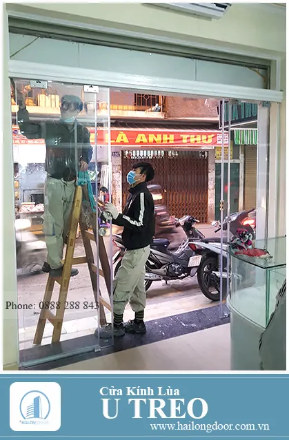 Cửa kính lùa treo ray nhôm